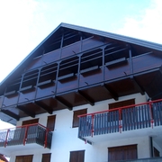 VERNICIATURA PALAZZINA RIVESTITA IN LIGNO