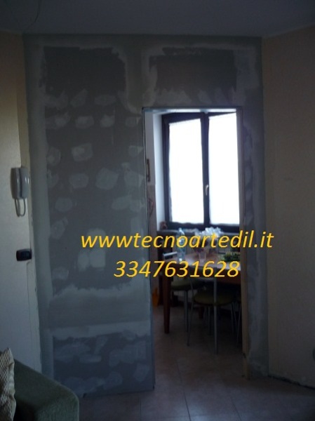 Foto: montaggio porta scorrevole per cartongesso ,parette in ... Montare porta scorrevole