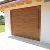 Porte scorrevoli effetto legno per chiusura veranda