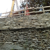 Muro in cemento armato rivestito in pietra