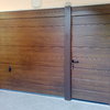 Portone basculante pvc color noce con porta