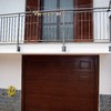 Riparazione/sostituzione porta sezionale a cassettoni colore verde ral 6005w effetto legno