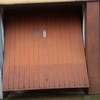 Sostituzione porta basculante con guide murate
