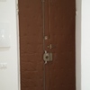 Restauro porta d'ingresso di appartamento interna