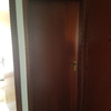 Chiusura porta e nicchia termosifone in muratura