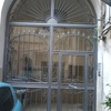 Sostituzione portone d'ingresso stabile condominiale