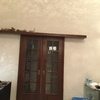 Verniciatura porta in legno scorrevole