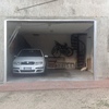 Realizzazione porta garage a due battenti