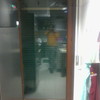 Installazione portafinestra in alluminio in locale commerciale
