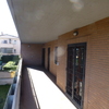 Chiusura parte del terrazzo per fare una veranda