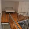 Tendaggio con binario a soffitto per soppalco